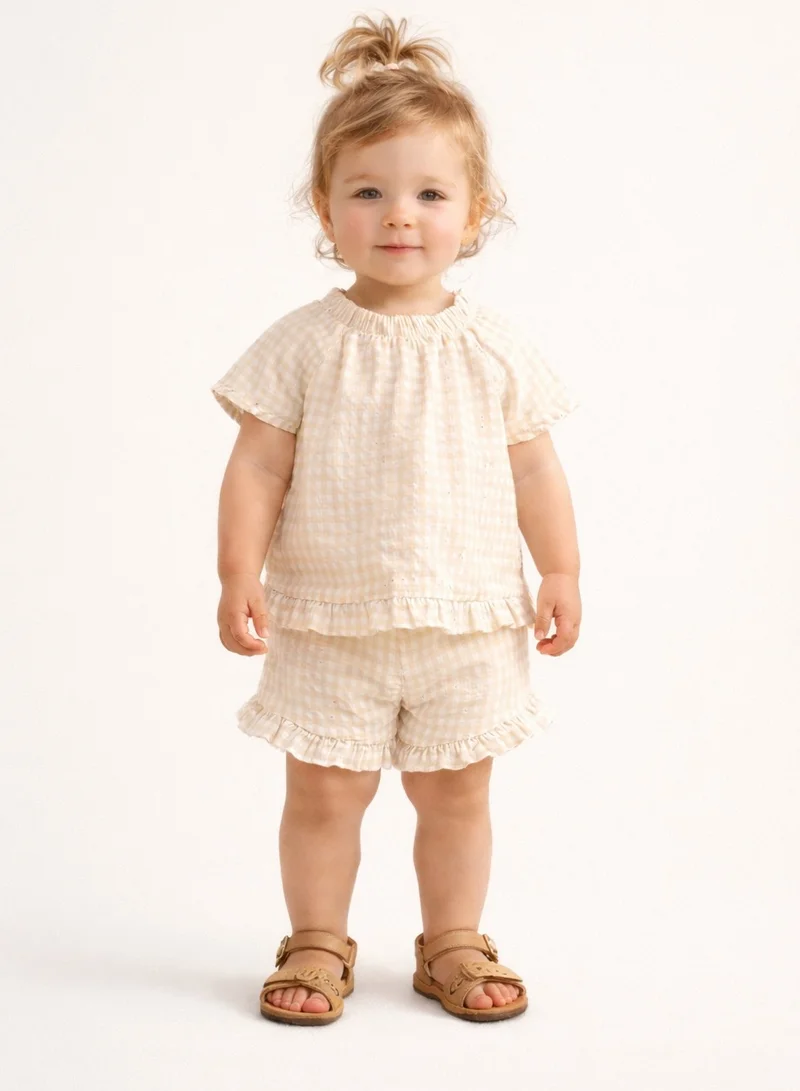 ديركجي طقم بناتي قطعتين بلوزة بأكمام مكشكشة وشورت من نسيج الوافل